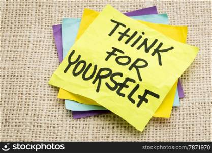 think for yourself advice on a sticky note against burlap canvas