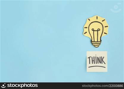 think sticky note hand drawn yellow light bulb blue background