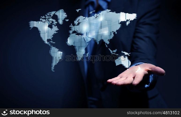 Think wide and global. Close view of businessman showing world map in palm