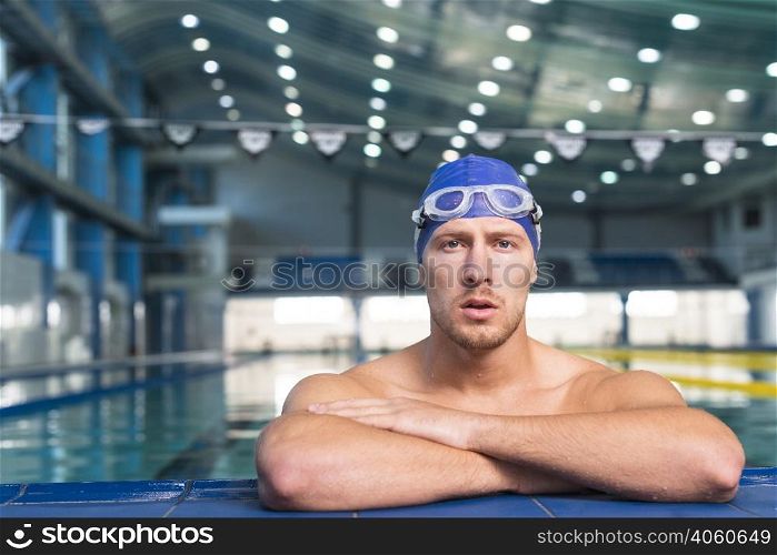 thinking male swimmer looking grapher