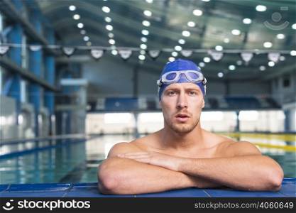 thinking male swimmer looking grapher