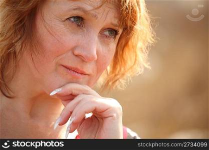 Thinking middleaged woman