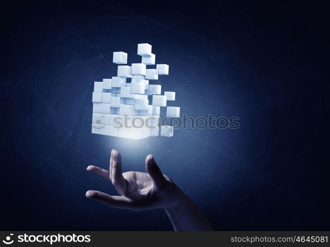 Thinking outside the box as concept. Businessman hand touch cube as symbol of problem solving