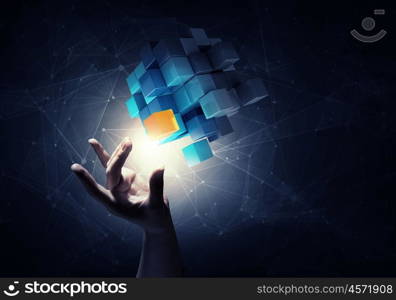 Thinking outside the box as concept. Businesswoman hand touch cube as symbol of problem solving