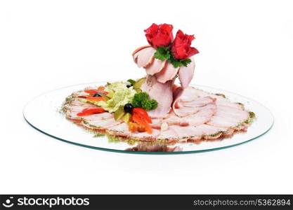 Thinly sliced pieces of meat on plate
