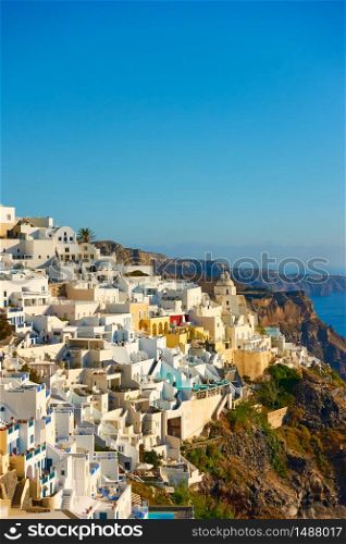 Thira town on the cliff in Santorini island in the evening, Greece -- Greek landscape - cityscape