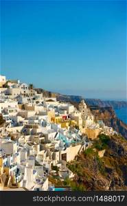 Thira town on the cliff in Santorini island in the evening, Greece -- Greek landscape - cityscape