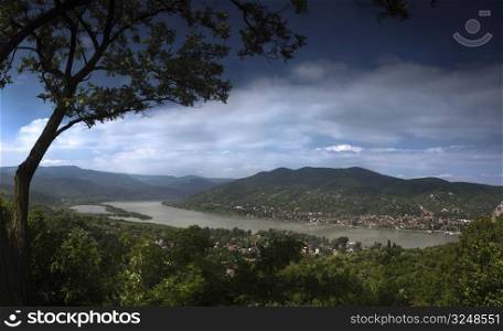 This is a landscape with river in the valley. The location is the bend of Danube in Hungary during a the most higher flood in the past 100 years.