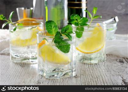 This is a light and refreshing summer cocktail with a white port, mixed with dry or sweet wine with a few drops of orange and a hint of mint.