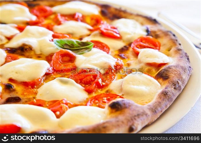 This is a true Italian Pizza. Traditional Pizza Margherita served in a Capri&rsquo;s restaurant, Naples Gulf, Italy.