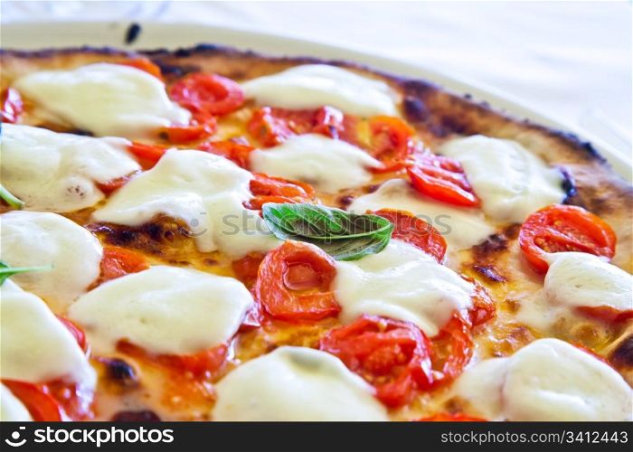 This is a true Italian Pizza. Traditional Pizza Margherita served in a Capri&rsquo;s restaurant, Naples Gulf, Italy.