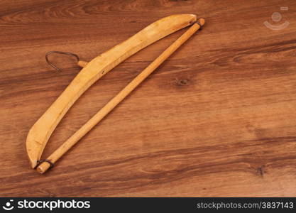 This is a wooden coat hanger than old times. Very beautiful design on the wood.