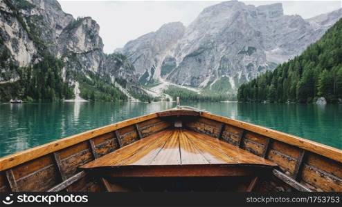 this is an awesome view of wooden boat in lake