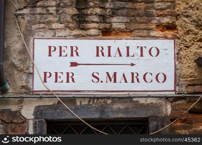 This is the tipical Venice street sign with indication to San Marco Square and Rialto Bridge