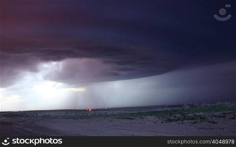 "This "mother ship" looking storm is in the process of splitting, Burlington, Colorado, USA"