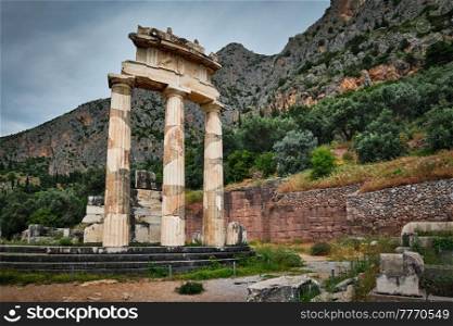 Tholos with Doric columns at the sanctuary of Athena Pronoia temple ruins in ancient Delphi, Greece. Athena Pronoia temple ruins in ancient Delphi, Greece