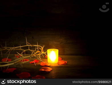 thorns candle and rose petals christian symbol. thorns of the crown of christ and candles. Christianity symbol