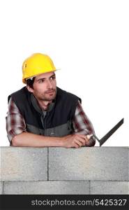 Thoughtful bricklayer