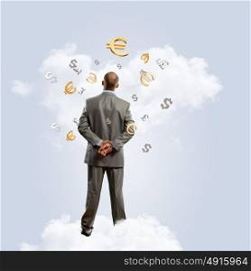 Thoughtful businessman. Image of thoughtful businessman standing with back