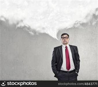 Thoughtful businessman. Middle aged businessman and white blank cloud above his head