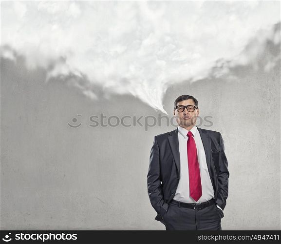 Thoughtful businessman. Middle aged businessman and white blank cloud above his head