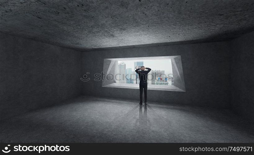 Thoughtful businessman standing in empty space concrete room with bright window and cityscape view . Mixed media .