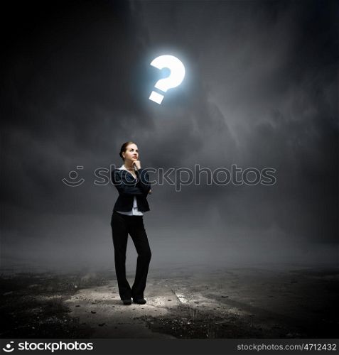 Thoughtful businesswoman. Image of concentrated businesswoman looking for answer
