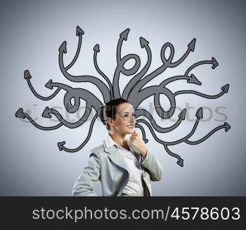 Thoughtful businesswoman with arrows and thoughts coming out of her head. Let me think over