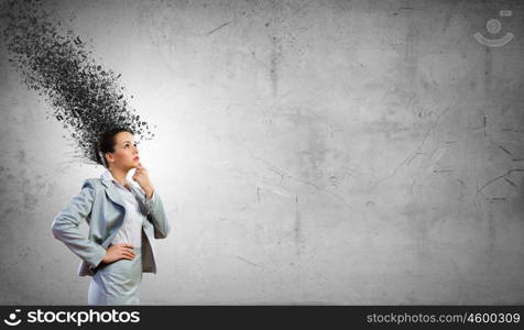 Thoughtful businesswoman. Young attractive businesswoman with thoughts above her head