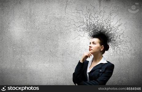 Thoughtful businesswoman. Young attractive businesswoman with thoughts above her head
