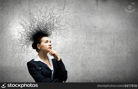 Thoughtful businesswoman. Young attractive businesswoman with thoughts above her head
