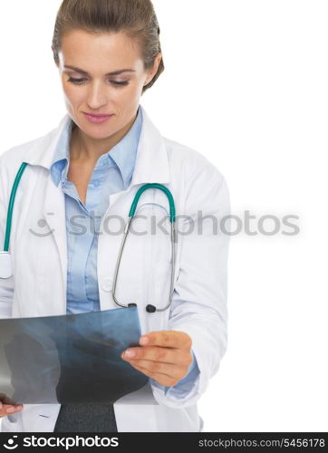 Thoughtful doctor woman checking fluorography