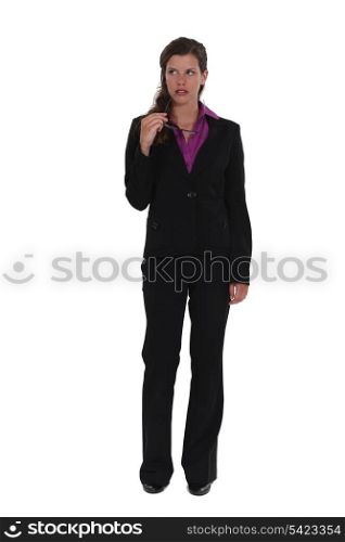 Thoughtful full length businesswoman