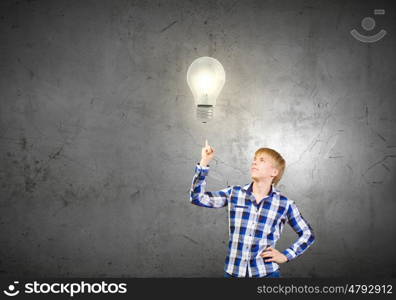 Thoughtful guy. Young handsome man in casual thinking over something