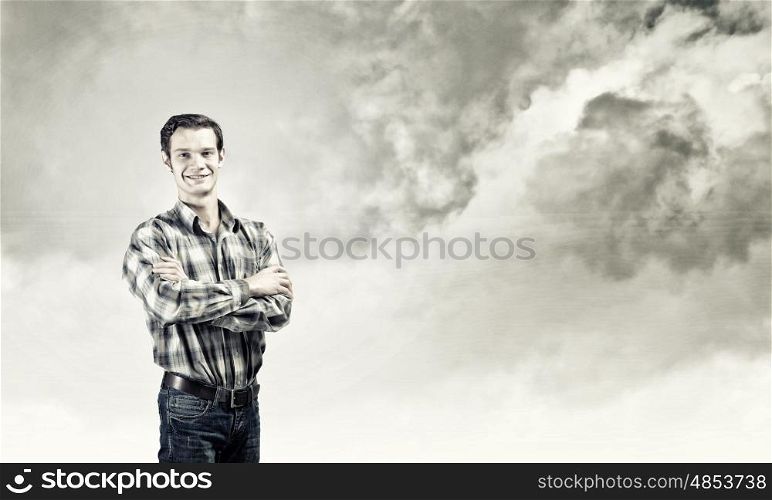Thoughtful guy. Young handsome man in casual thinking over something