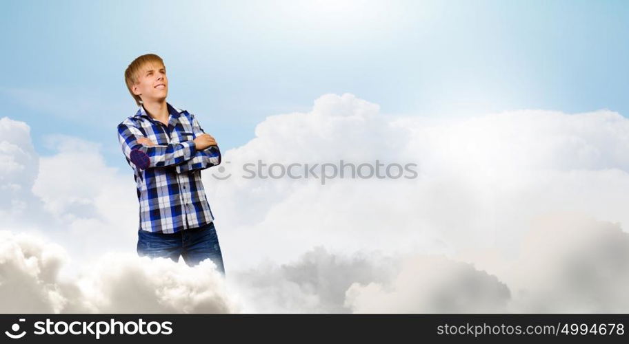 Thoughtful guy. Young handsome man in casual thinking over something