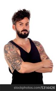 Thoughtful handsome man with tattoos isolated on a white background