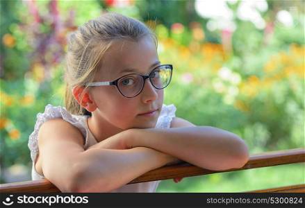 Thoughtful little girl outdoor