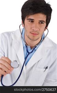 Thoughtful male doctor student with stethoscope on white background