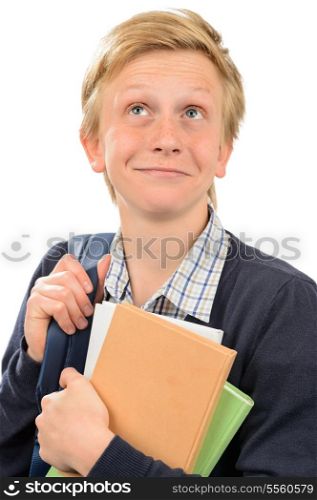 Thoughtful teenage student boy holding books against white background
