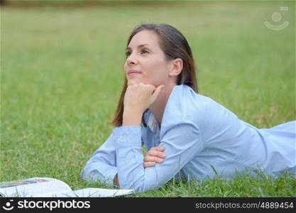 thoughtful woman in the park