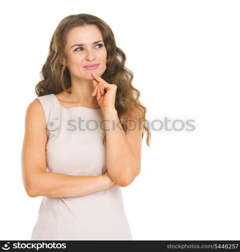 Thoughtful young woman looking on copy space