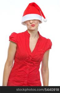 Thoughtful young woman with Christmas hat over eyes