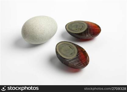Thousand years duck egg on white background