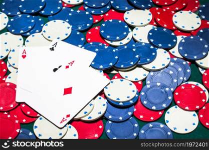 three aces card white blue red casino chips. High resolution photo. three aces card white blue red casino chips. High quality photo