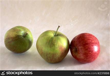 three apples on painted background