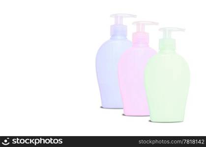 Three blank colorful bottles of soap dispencer with copyspace