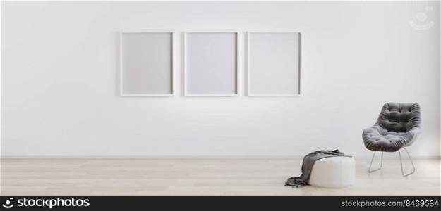 three blank poster frames in room with white wall and wooden floor with white pouf and grey modern armchair. Bright room interior with empty frames mockup. 3d rendering
