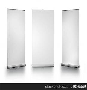 Three blank roll-up posters on white background. Blank roll-up posters