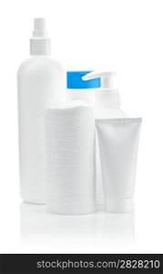 three bottles with pads and tube
